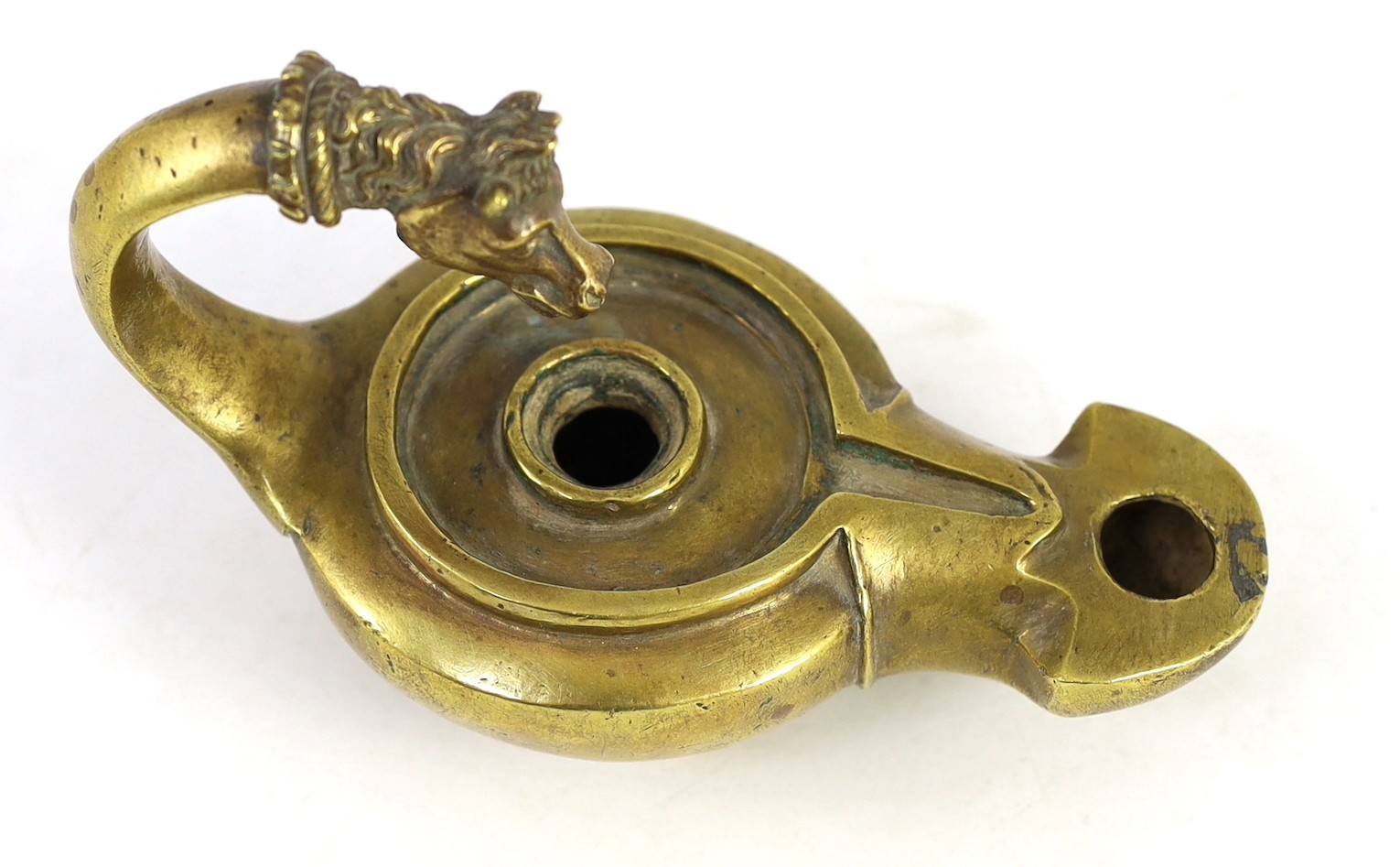 A Renaissance or Roman bronze oil lamp, 17.5cm long